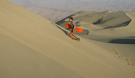 Sandboarder On Cerro Blanco Dunes - Nasca, Peru