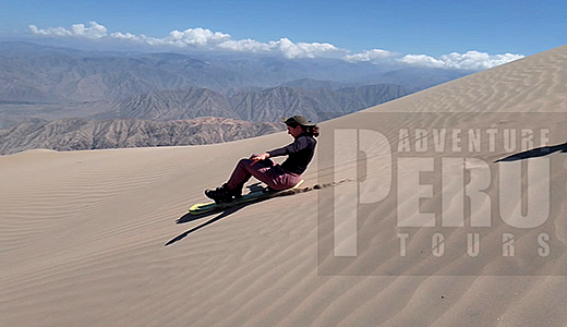 Sliding down from Cerro Blanco dune